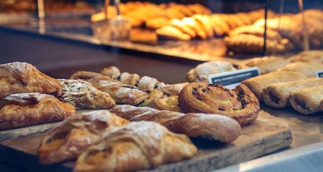 Greggs (LSE:GRG) H1 FY25 Sales Up 6.9%, Profit Guidance Trimmed Amid Weather Impact